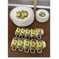 Back Road Vintage Valuables set of 1970s Grindleys Mayflower plates and mugs with yellow floral pattern and green trim.