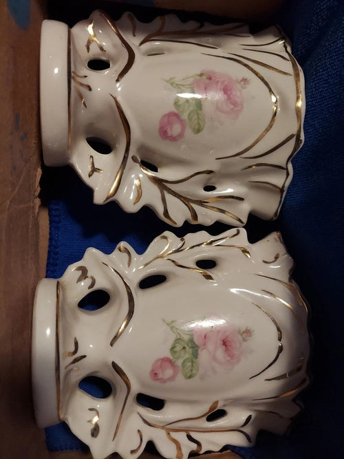 Back Road Vintage Valuables pair of white porcelain spill vases with pink roses and gold trim, featuring ornate cutouts.